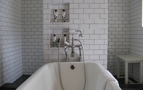 white tiled bath with niche white tiled bath with niche